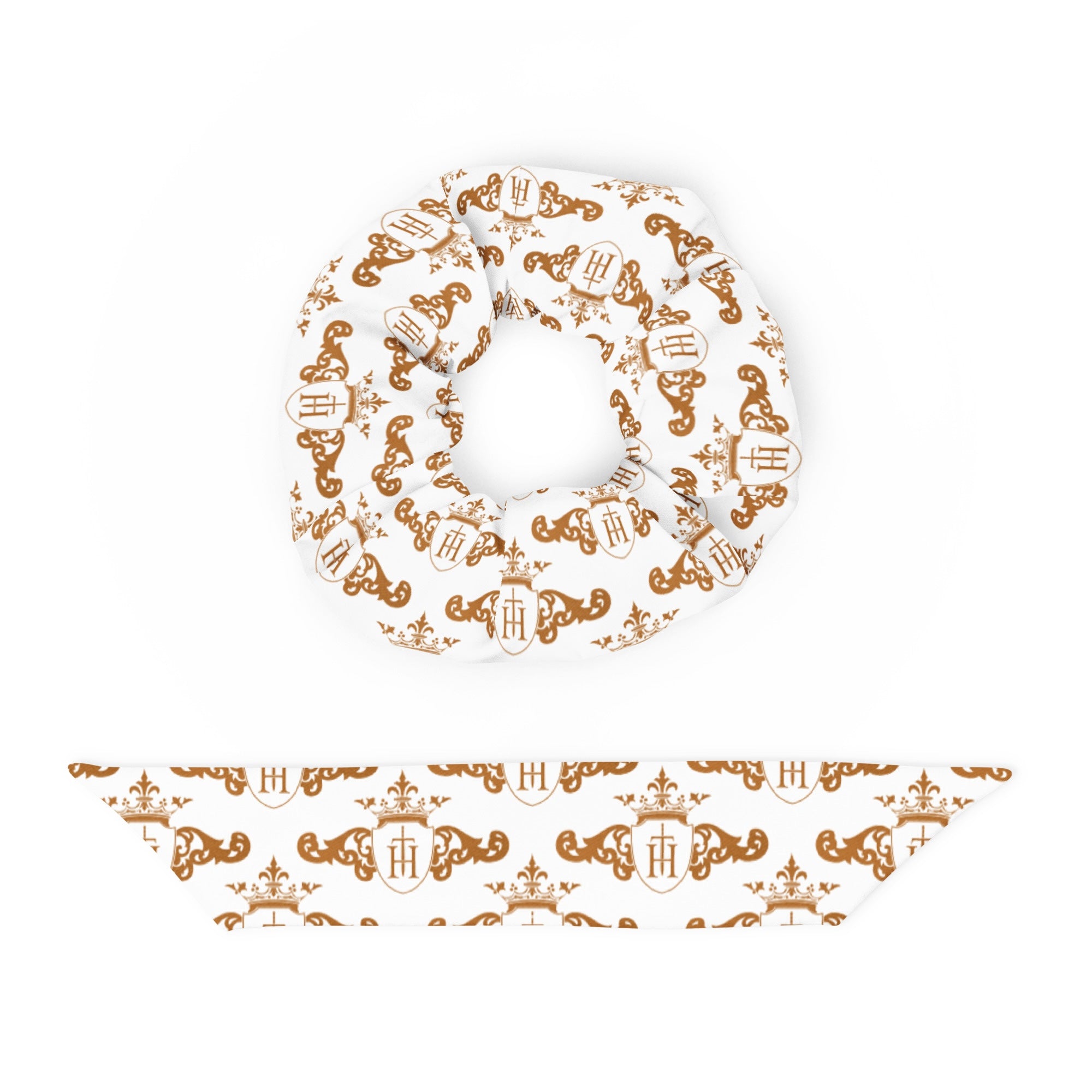 Decorative plate with intricate gold crest patterns on a white background
