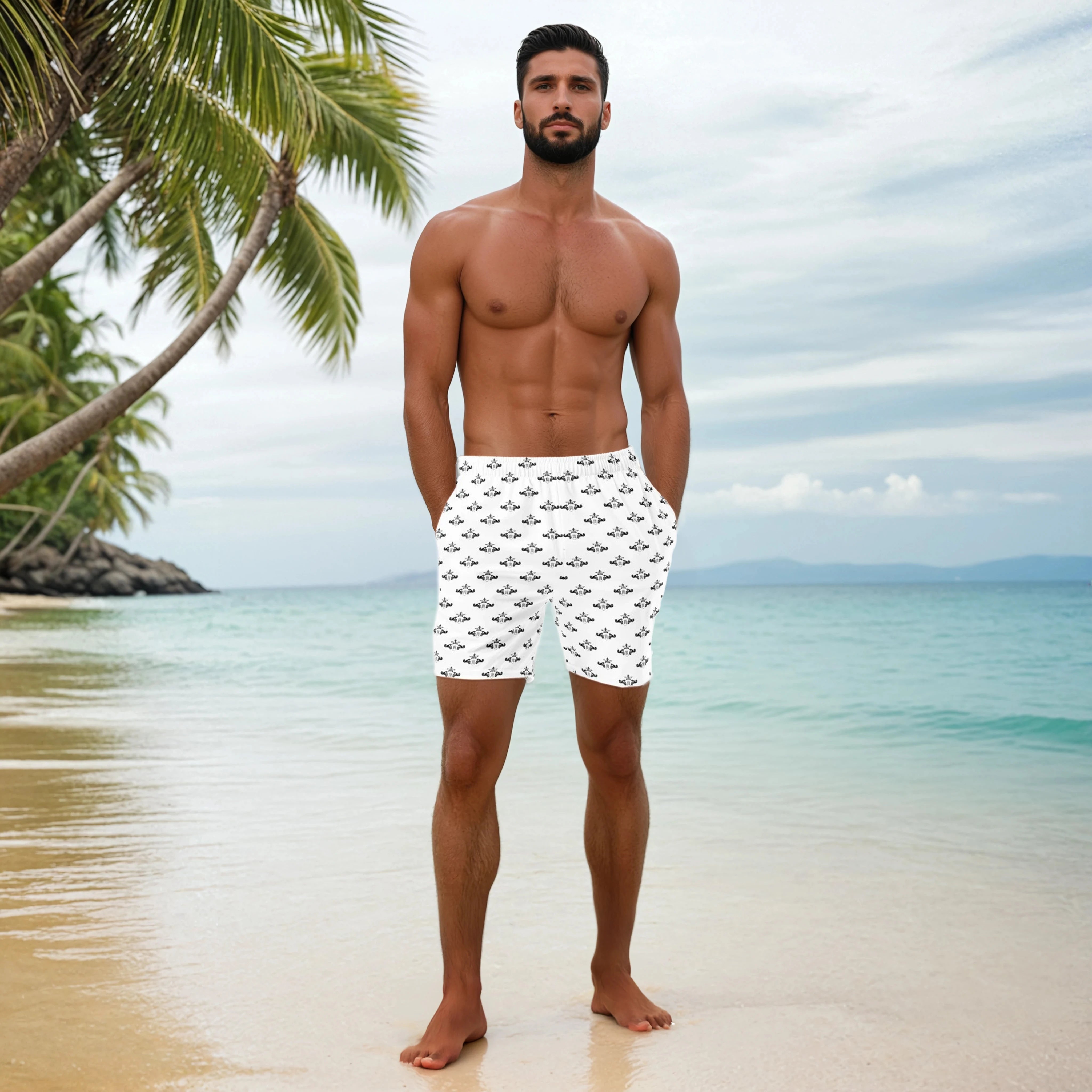 Man wearing white swim shorts with a black crest pattern on a tropical beach