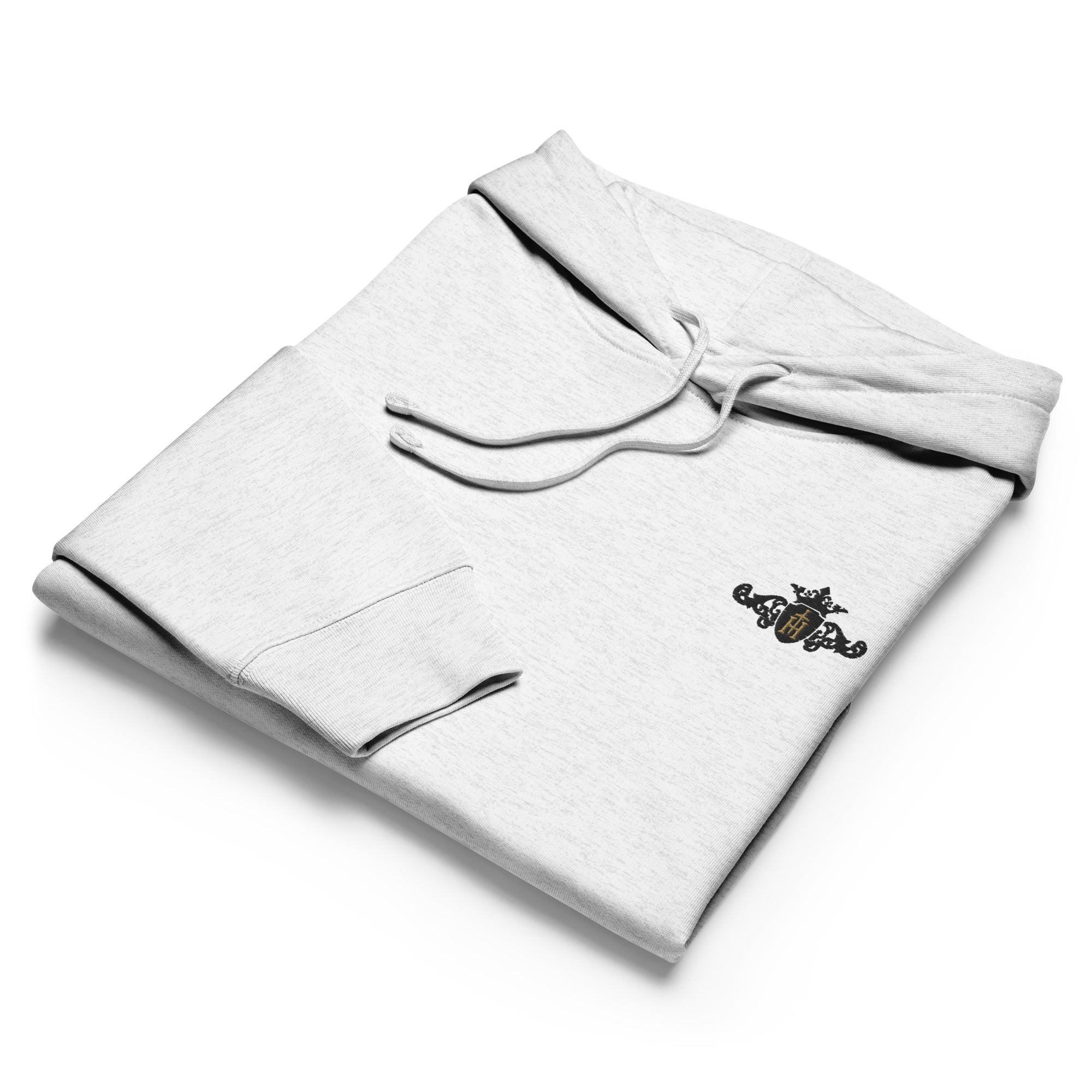 Folded gray hoodie with a logo on a white background
